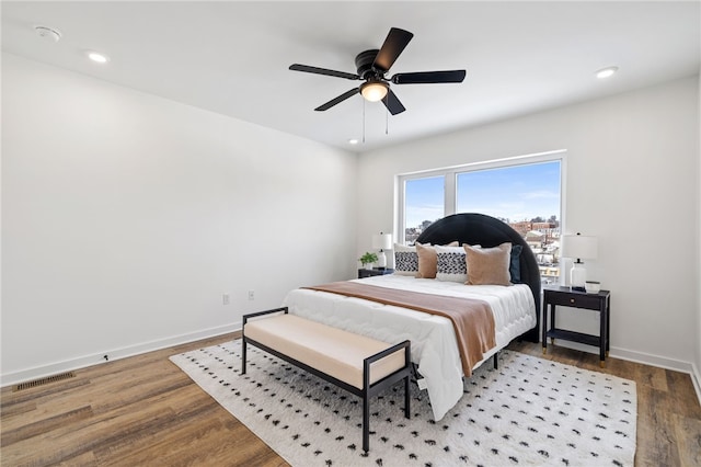 2127 Rose St, Hill District, PA 15219 - bedroom with wood finished floors, baseboards, ceiling fan, and recessed lighting