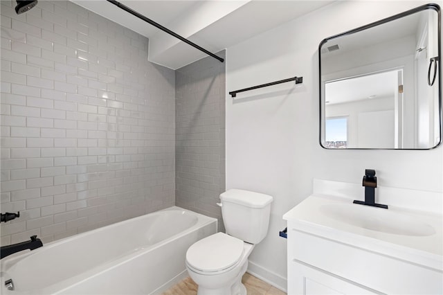 2127 Rose St, Hill District, PA 15219 - bathroom featuring vanity, toilet, tub / shower combination, and baseboards