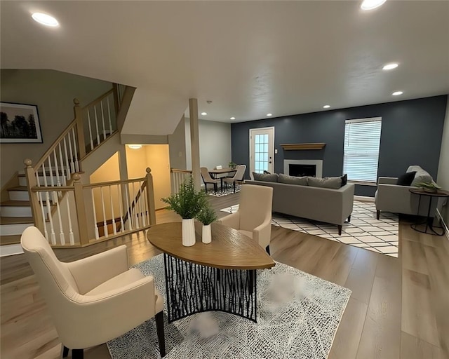 124 Hillvue Dr, Seven Fields Boro, PA 16046 - living room featuring stairway, wood finished floors, recessed lighting, and a fireplace