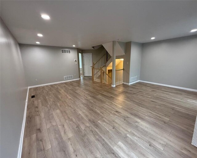 124 Hillvue Dr, Seven Fields Boro, PA 16046 - below grade area featuring recessed lighting, wood finished floors, and stairs