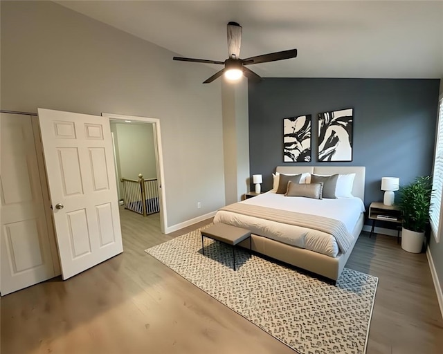 124 Hillvue Dr, Seven Fields Boro, PA 16046 - bedroom with lofted ceiling, wood finished floors, and a ceiling fan