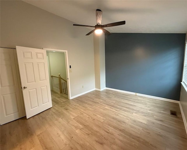 124 Hillvue Dr, Seven Fields Boro, PA 16046 - unfurnished bedroom with light wood-type flooring, lofted ceiling, and ceiling fan