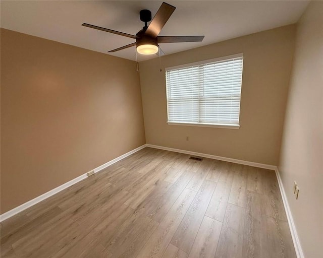124 Hillvue Dr, Seven Fields Boro, PA 16046 - empty room featuring a ceiling fan and wood finished floors