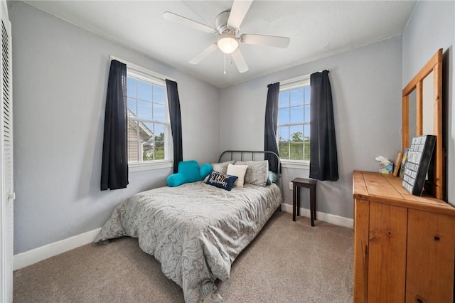 1204 Scorer St, Lincoln Place, PA 15207 - bedroom with light carpet, baseboards, and a ceiling fan
