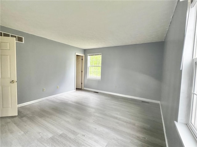 123 Pine Creek Dr, Peters Twp, PA 15367 - empty room with baseboards and wood finished floors