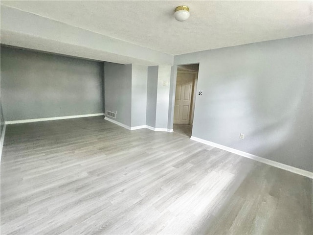 123 Pine Creek Dr, Peters Twp, PA 15367 - unfurnished room featuring baseboards and wood finished floors