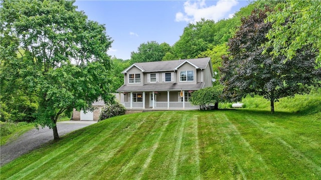 565 Leeper Rd, Green Twp, PA 15043 - view of front of property with covered porch, asphalt driveway, and a front yard