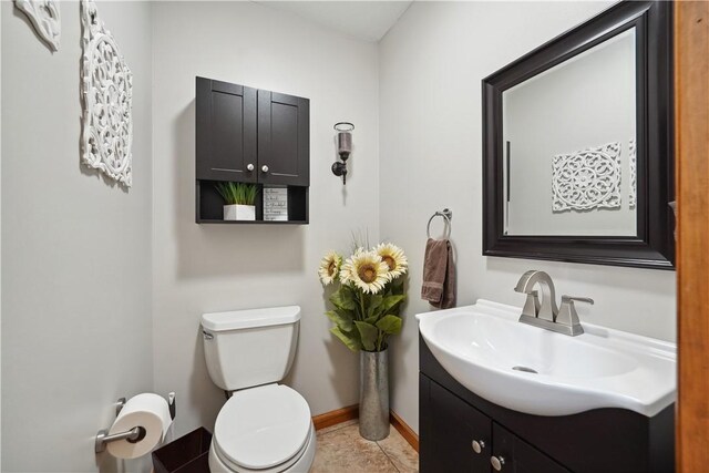 565 Leeper Rd, Green Twp, PA 15043 - half bathroom with toilet, vanity, and baseboards
