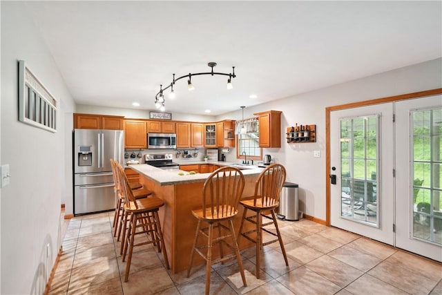 565 Leeper Rd, Green Twp, PA 15043 - kitchen with stainless steel appliances, a sink, healthy amount of natural light, baseboards, and recessed lighting