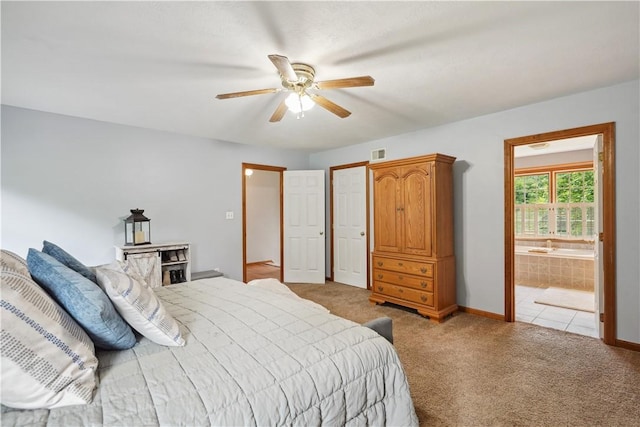 565 Leeper Rd, Green Twp, PA 15043 - bedroom with carpet flooring, ensuite bathroom, baseboards, and a ceiling fan