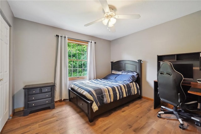 565 Leeper Rd, Green Twp, PA 15043 - bedroom with light wood-style flooring, a ceiling fan, an office area, and baseboards