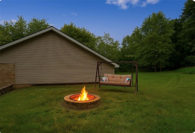 565 Leeper Rd, Green Twp, PA 15043 - view of green lawn with an outdoor living space with a fire pit