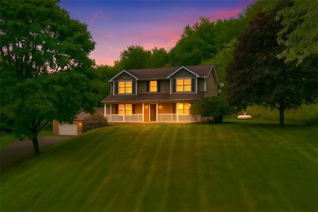 565 Leeper Rd, Green Twp, PA 15043 - back of house with driveway, covered porch, and a lawn