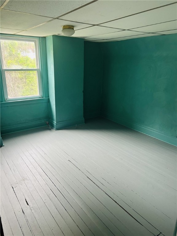 4236 Haldane St, Greenfield, PA 15207 - unfurnished room with light wood-style floors, baseboards, and a drop ceiling