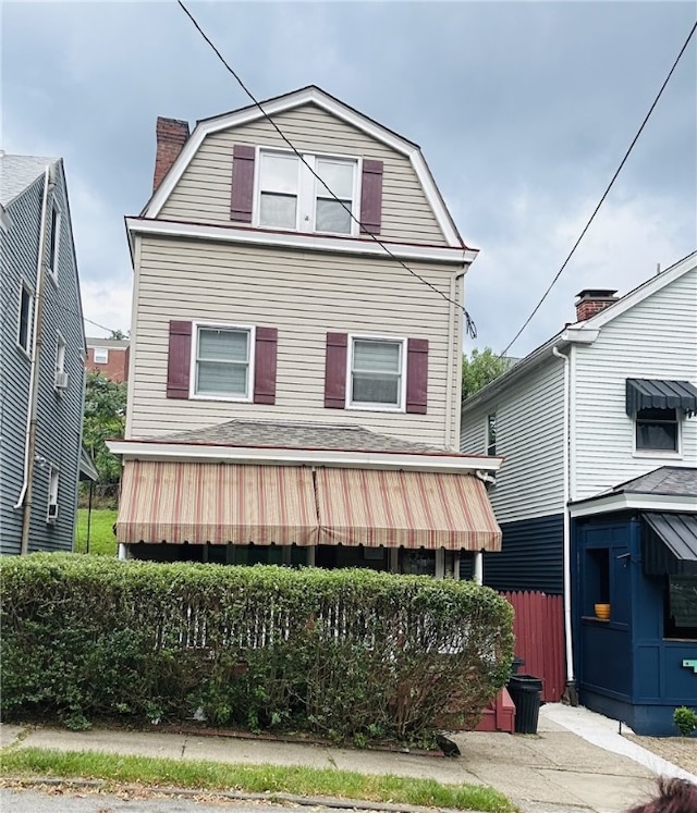 4236 Haldane St, Greenfield, PA 15207 - colonial inspired home featuring a gambrel roof and a chimney