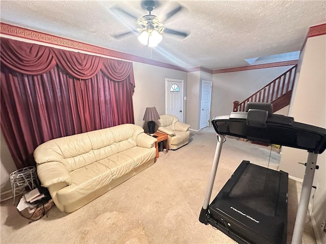 1308 Main St, Aliquippa, PA 15001 - living room with carpet floors, a ceiling fan, a textured ceiling, stairs, and crown molding