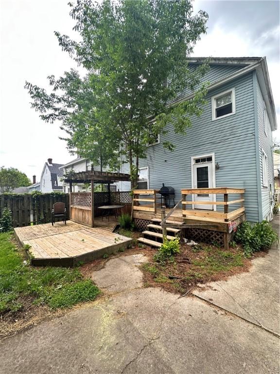 1308 Main St, Aliquippa, PA 15001 - back of property with a deck and a pergola