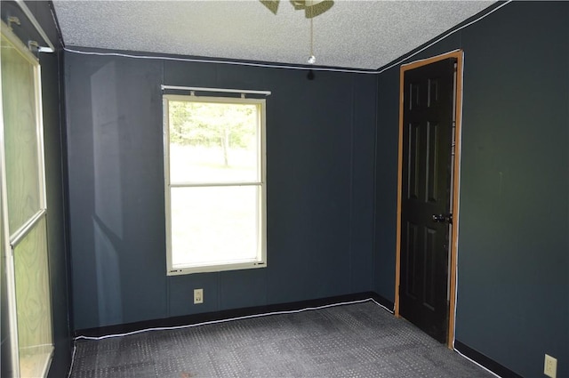 122 Arrowhead Rd, Allegheny Twp But, PA 16373 - unfurnished room with dark carpet and a textured ceiling