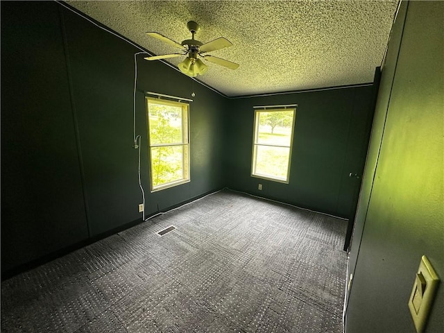 122 Arrowhead Rd, Allegheny Twp But, PA 16373 - unfurnished room featuring a textured ceiling, ceiling fan, vaulted ceiling, and carpet