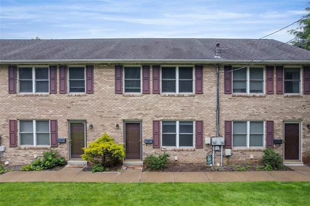 331 Glaser Ave Unit C, Bellevue, PA 15202 - view of front of house featuring brick siding and a shingled roof