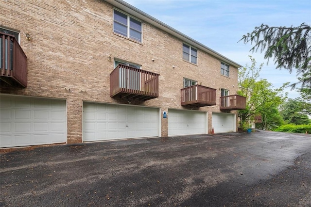 331 Glaser Ave Unit C, Bellevue, PA 15202 - back of house with brick siding and a garage