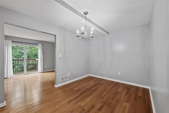 331 Glaser Ave Unit C, Bellevue, PA 15202 - unfurnished room featuring a chandelier, baseboards, and wood finished floors