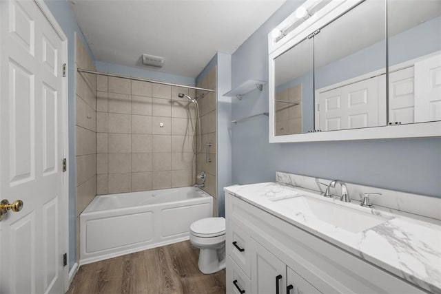 331 Glaser Ave Unit C, Bellevue, PA 15202 - full bath featuring wood finished floors, vanity, bathtub / shower combination, and toilet
