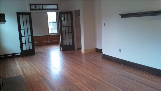 17 Lenox Ave, Forest Hills Boro, PA 15221 - spare room featuring french doors, wood finished floors, and baseboards