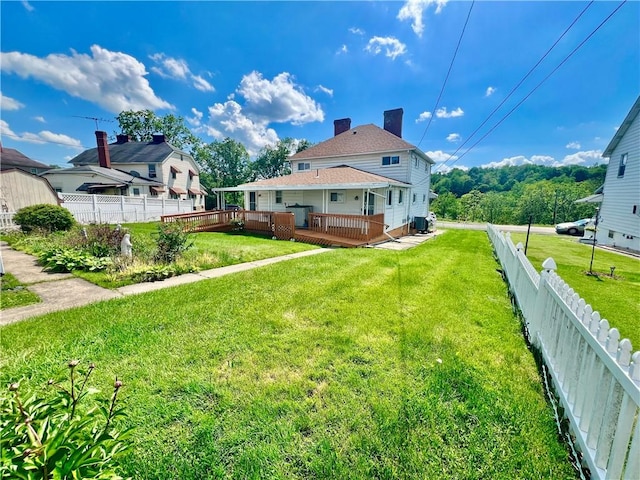 1129 1st St, Redstone Twp, PA 15442 - rear view of property with a deck