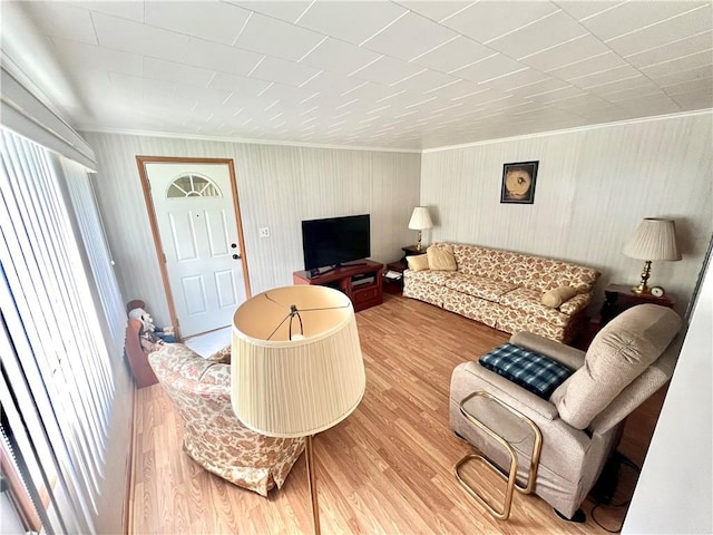 1129 1st St, Redstone Twp, PA 15442 - living room featuring crown molding and light wood-type flooring