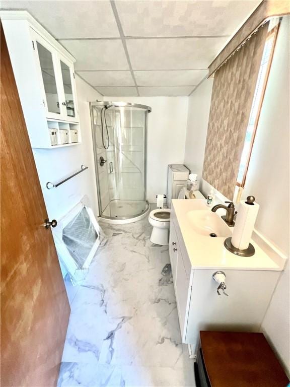 1129 1st St, Redstone Twp, PA 15442 - full bath with a stall shower, toilet, vanity, marble finish flooring, and a paneled ceiling