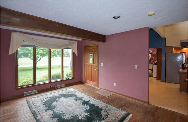 105 Janice Ln, Saxonburg, PA 16056 - living area featuring hardwood / wood-style flooring and beamed ceiling
