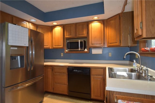 105 Janice Ln, Saxonburg, PA 16056 - kitchen featuring appliances with stainless steel finishes, brown cabinets, light countertops, and recessed lighting