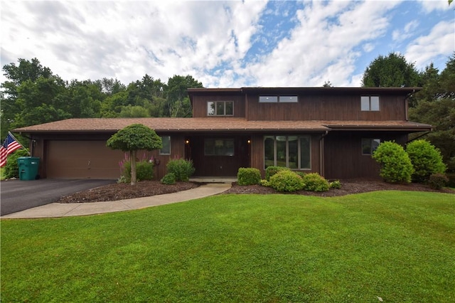 105 Janice Ln, Saxonburg, PA 16056 - view of front of property with asphalt driveway, a front lawn, and a garage