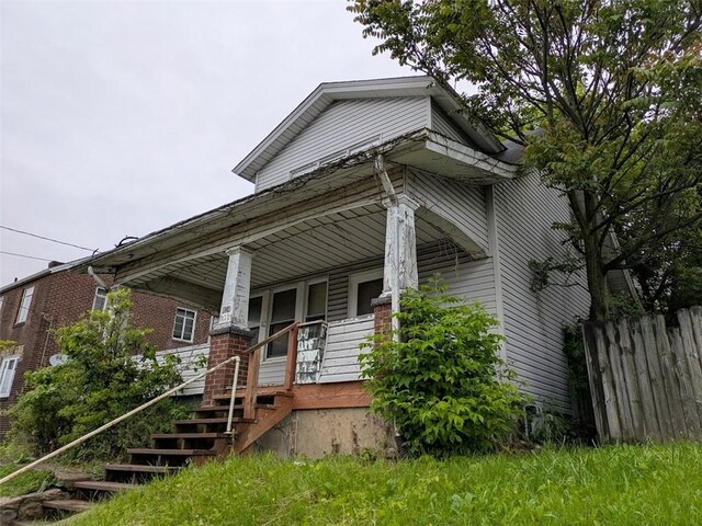 424 N 2nd St, Jeannette, PA 15644 - view of front of home with a porch and stairs