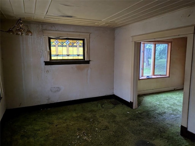 424 N 2nd St, Jeannette, PA 15644 - empty room featuring plenty of natural light, carpet flooring, and baseboards