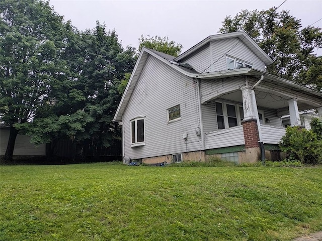 424 N 2nd St, Jeannette, PA 15644 - view of property exterior featuring a lawn and a porch