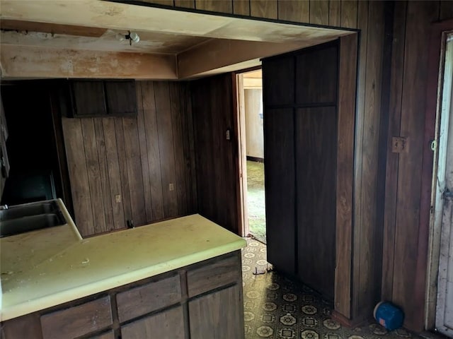 424 N 2nd St, Jeannette, PA 15644 - kitchen with wood walls and light countertops
