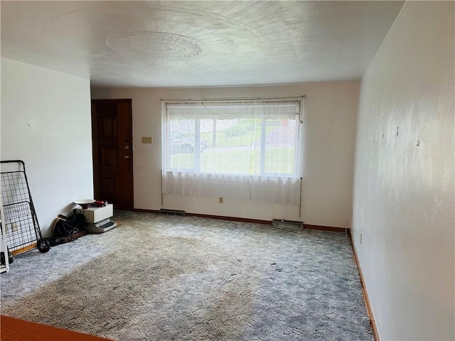1026 Jefferson Ave, Jeannette, PA 15644 - unfurnished living room featuring carpet and baseboards