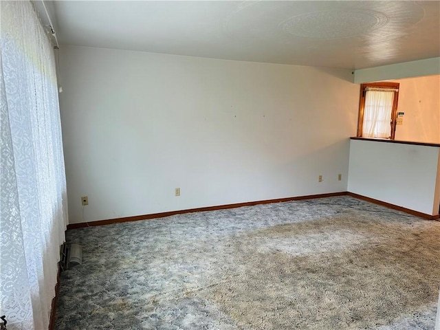 1026 Jefferson Ave, Jeannette, PA 15644 - carpeted spare room featuring baseboards