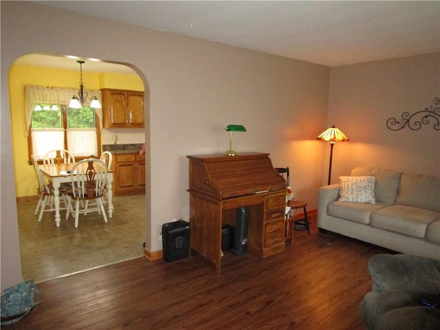 2255 Rombold, Hermitage, PA 16148 - living area featuring arched walkways, wood finished floors, baseboards, and a chandelier