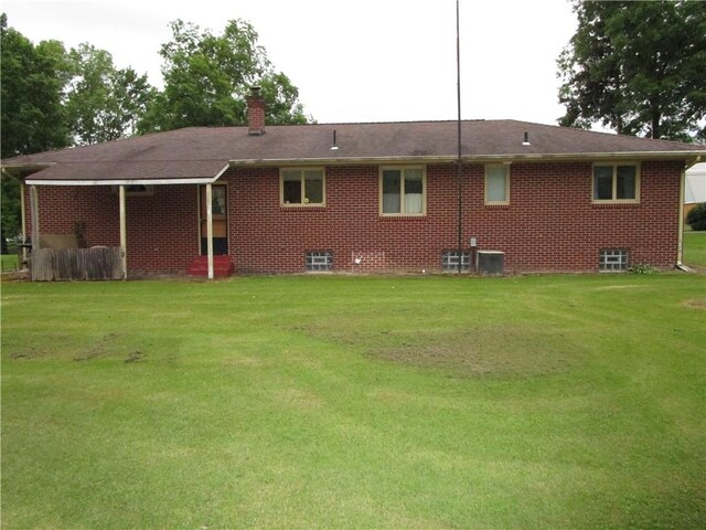 2255 Rombold, Hermitage, PA 16148 - back of property featuring a lawn, a chimney, and brick siding