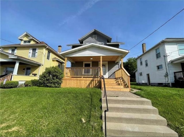 1049 Adams St, New Castle/4Th, PA 16101 - view of front of property featuring a porch and a front yard