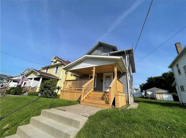 1049 Adams St, New Castle/4Th, PA 16101 - bungalow featuring a porch and a front yard