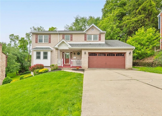 1198 Fox Terrier Dr, Bethel Park, PA 15102 - view of front of home featuring driveway, a front yard, brick siding, covered porch, and a garage