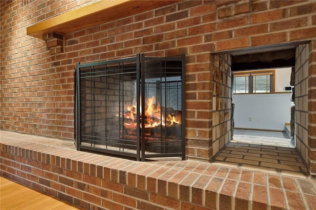 490 Hillside Ave, Monroeville, PA 15146 - detailed view of a brick fireplace and wood finished floors