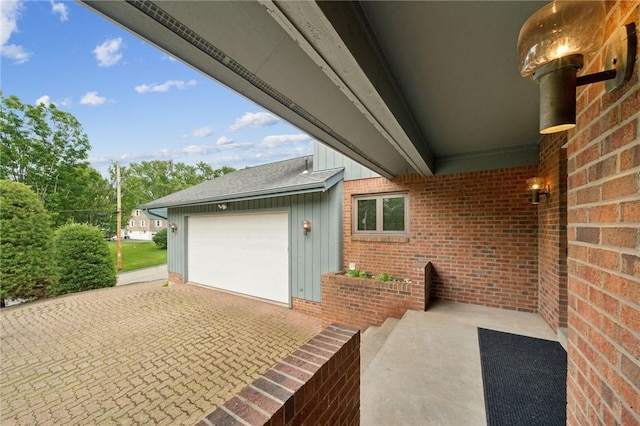 490 Hillside Ave, Monroeville, PA 15146 - view of patio with a garage and decorative driveway