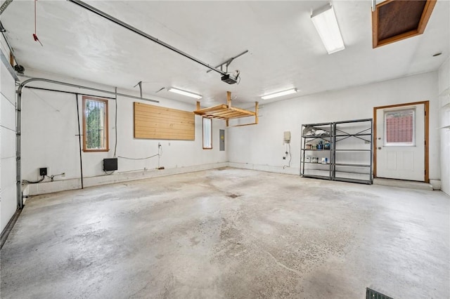 490 Hillside Ave, Monroeville, PA 15146 - garage featuring a garage door opener and electric panel