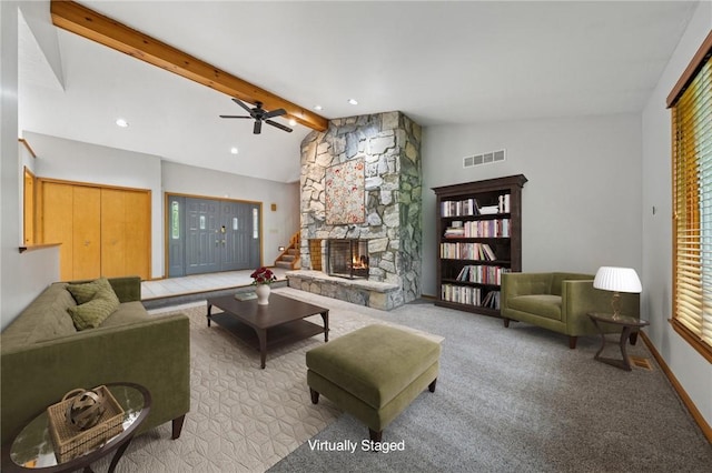 490 Hillside Ave, Monroeville, PA 15146 - living area featuring a fireplace, healthy amount of natural light, a ceiling fan, and light colored carpet