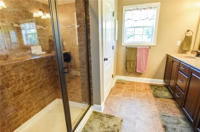 2000 Plantation Dr, Clinton Twp, PA 16056 - full bath featuring baseboards, vanity, a stall shower, and tile patterned flooring